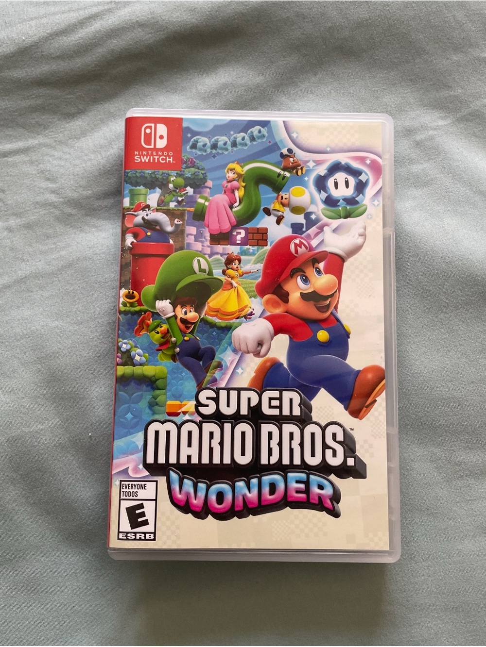 Nintendo Switch Super Mario Bros. Wonder - White Case with Multicolor Artwork